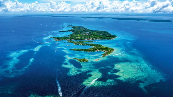 Aerial view of the lush, green Rosario Islands archipelago, a popular group of Colombian islands to visit near Cartagena.