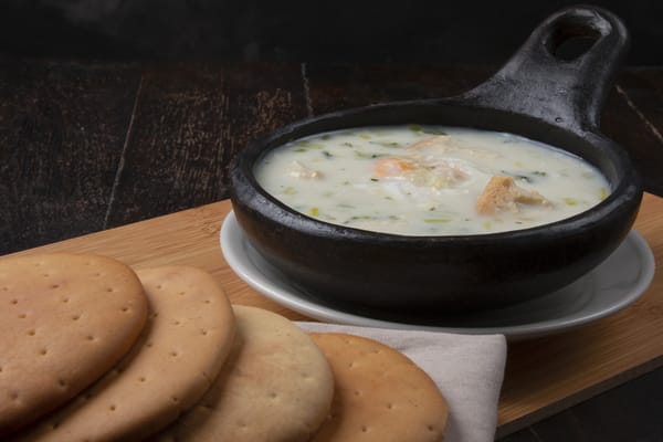 A bowl of Changua, the traditional milk and egg soup that is a unique Colombian breakfast dish from the Bogotá region.