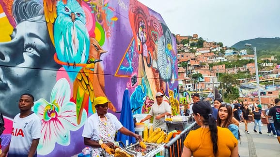 comuna 13 events and street art in medellin with a colorful and painted wall