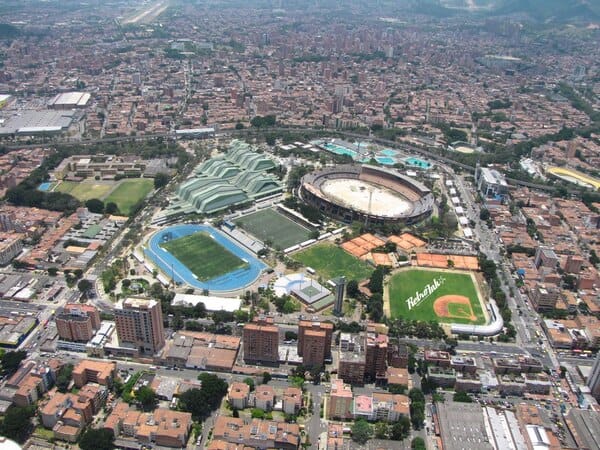 Aerial view of the Estadio Atanasio Girardot sports complex in Medellin, showcasing the heart of sport life medellin and infrastructure for medellin volleyball.