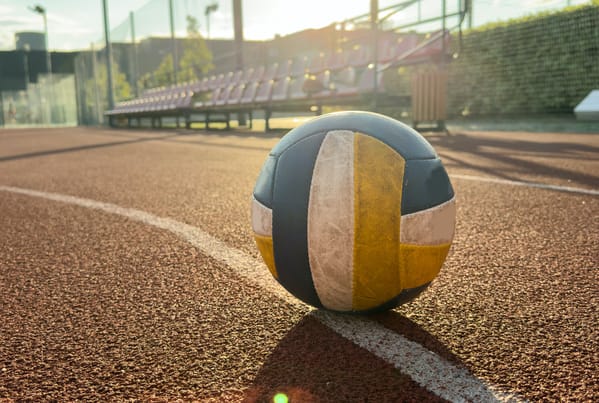 Volleyball on an outdoor court in Medellin, symbolizing the active sport life medellin and the vibrant medellin volleyball scene.